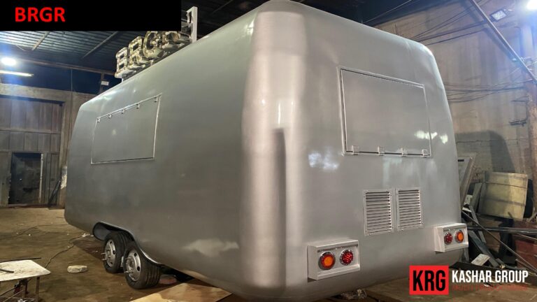 Mobile Solutions Silver food trailer with windows, vents, and tail lights