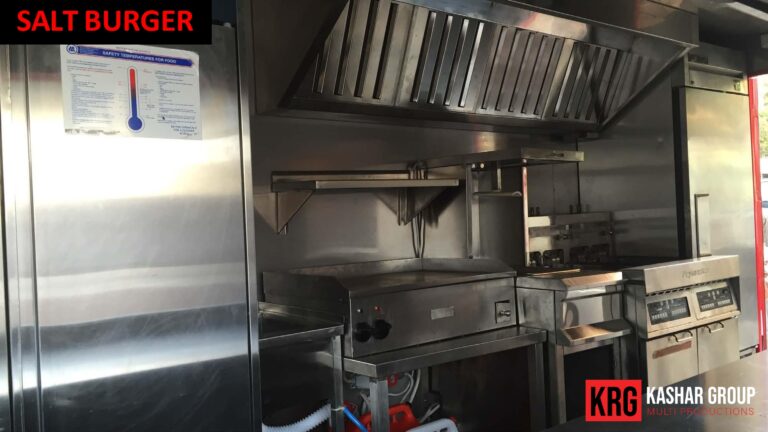 Mobile Solutions Food trailer kitchen with griddle, refrigerator, and ventilation hood