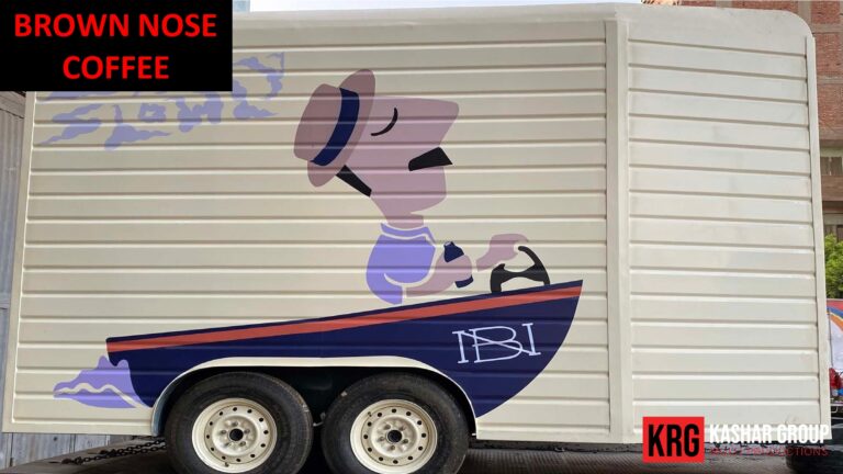 Mobile Solutions Brown Nose Coffee food trailer with cartoon character driving a boat