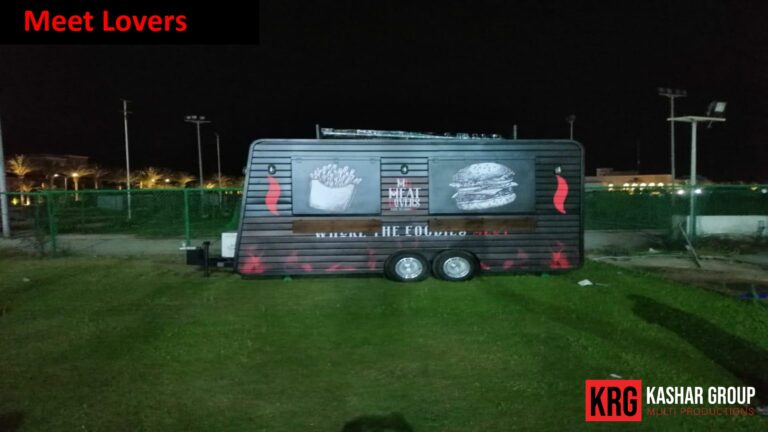 Mobile Solutions Food trailer named "Meat Lovers" with images of fries and a burger