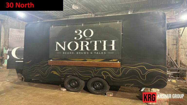 Mobile Solutions 30 North food trailer with black exterior and gold wavy design
