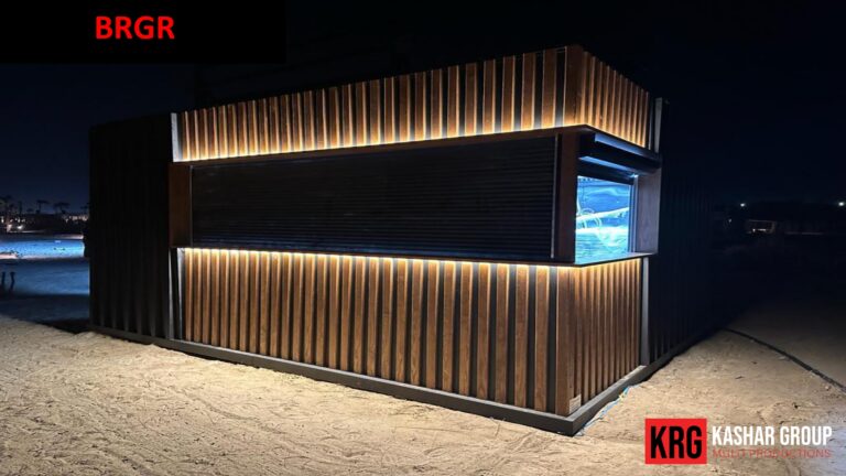 Mobile Solutions BRGR food container with modern wood exterior and illuminated service window at night