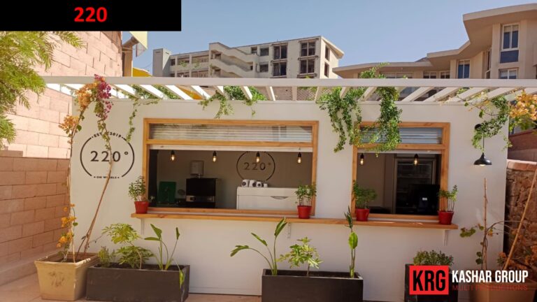 Mobile Solutions Exterior of a modern coffee shop built from a food container, featuring outdoor seating
