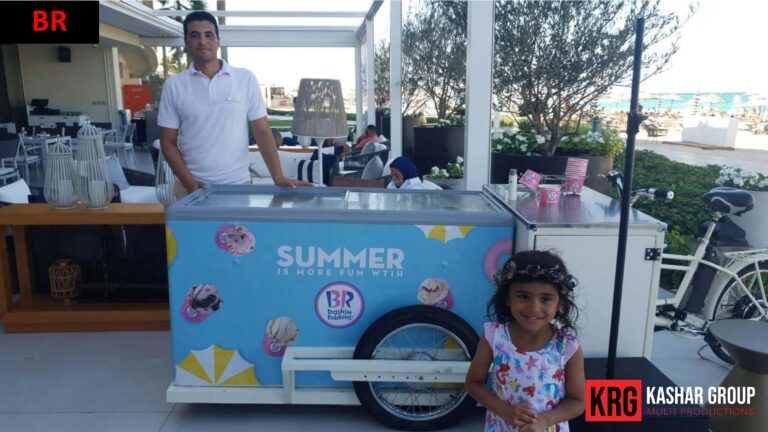 Mobile Solutions Baskin Robbins ice cream food trailer with a man and a child