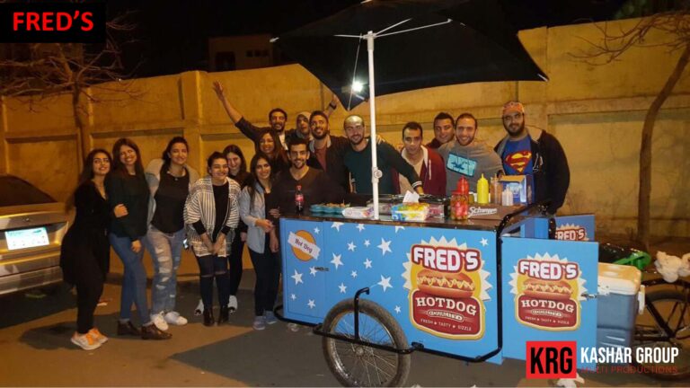 Mobile Solutions Fred's food trailer with staff and customers posing for photo