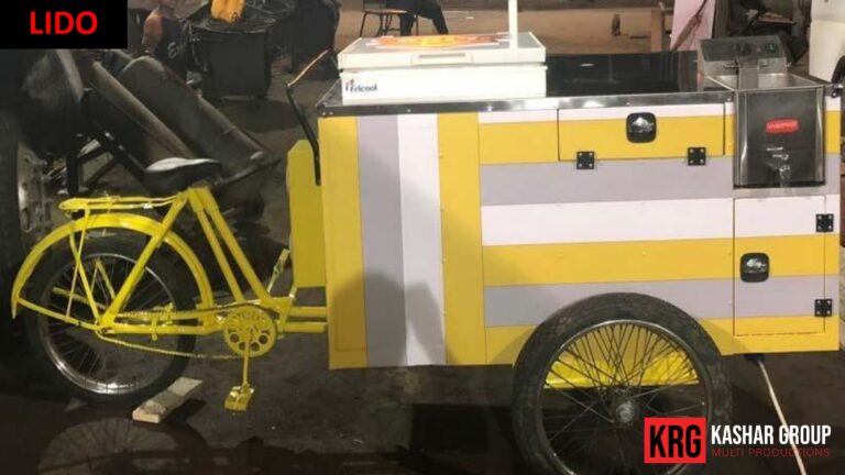 Mobile Solutions Yellow food trailer with a bicycle attached, "LIDO" text visible