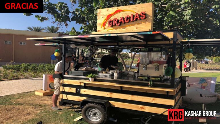 Mobile Solutions Gracias food trailer with wooden exterior and outdoor seating area