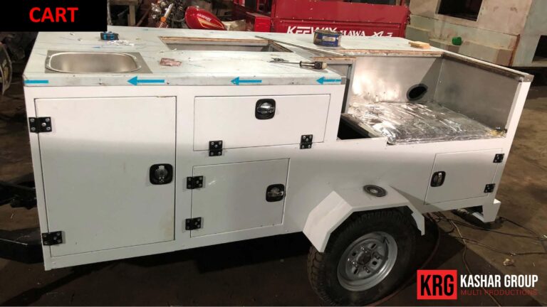 Mobile Solutions White food trailer with stainless steel sink, prep area, and storage cabinets