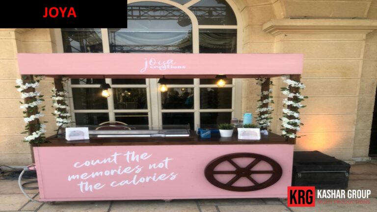Mobile Solutions Pink food trailer with "JOYA Creations" and "count the memories not the calories" text