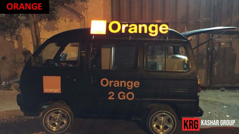 Mobile Solutions Black mobile van with "Orange 2 GO" branding, featuring an illuminated "Orange" sign