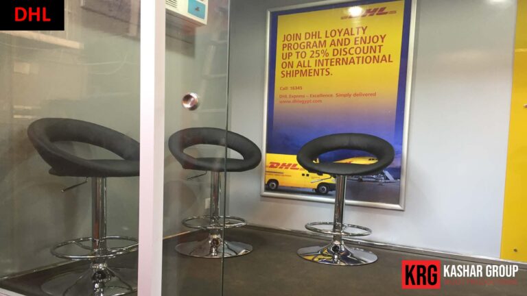 Mobile Solutions DHL advertising trailer with stools and promotional poster