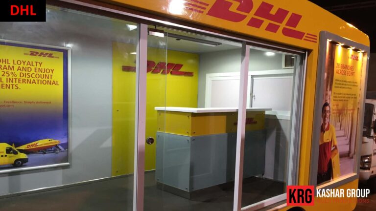 Mobile Solutions DHL advertising trailer with a service counter and branding