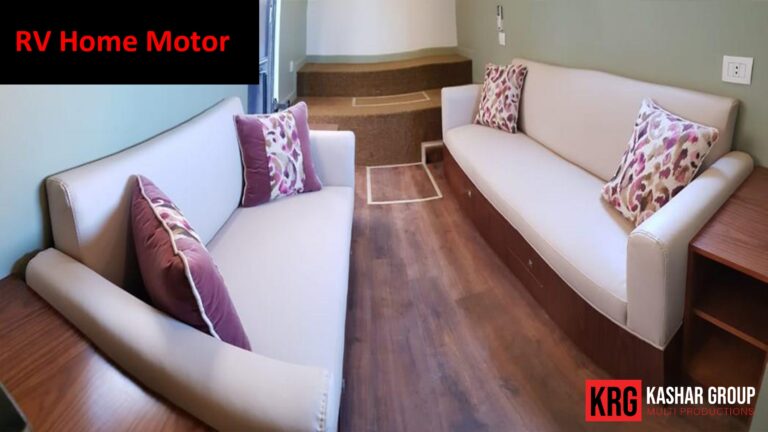 Mobile Solutions RV home motor interior with two white sofas and decorative pillows