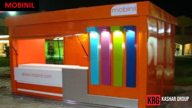 Mobile Solutions Orange Mobinil kiosk with colorful lighting and "www.mobinil.com" branding
