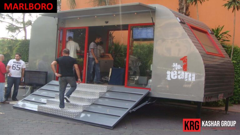 Mobile Solutions Advertising trailer with Marlboro branding, people entering via stairs