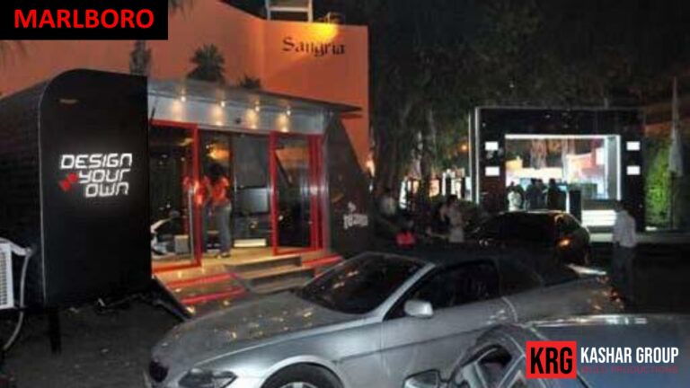 Mobile Solutions Marlboro advertising trailer and Sangria kiosk with cars