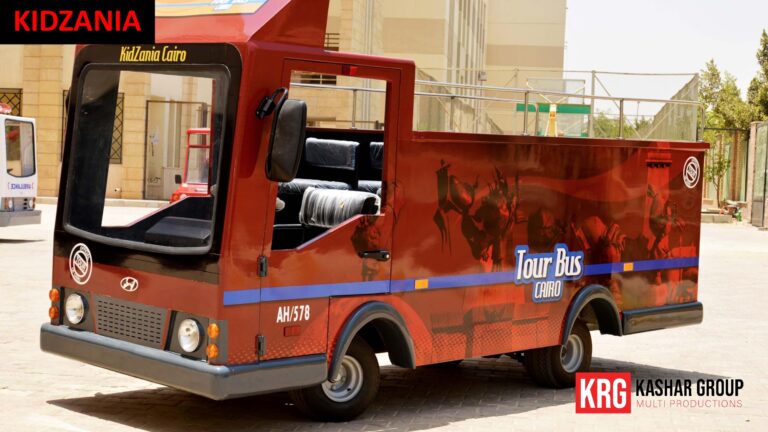 Mobile Solutions KidZania Cairo Tour Bus with "KidZania Cairo" and "Tour Bus CAIRO" text