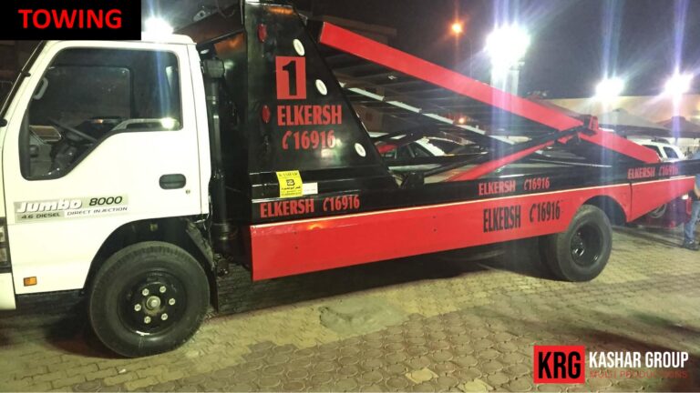 Mobile Solutions White Jumbo 8000 towing truck with red wrecker body, KASHAR GROUP logo