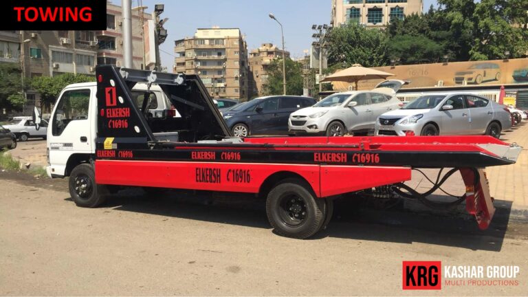 Mobile Solutions Red and white Elkersh towing truck with "TOWING" text