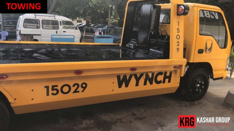 Mobile Solutions Yellow towing truck with "WYNC H" and "15029" on the side